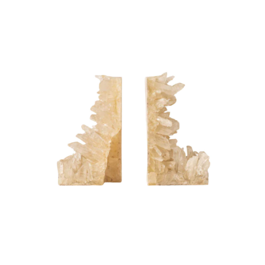 The Arrius Quartz Bookends are handcrafted from natural quartz, each showcasing unique color variations and natural patterns.