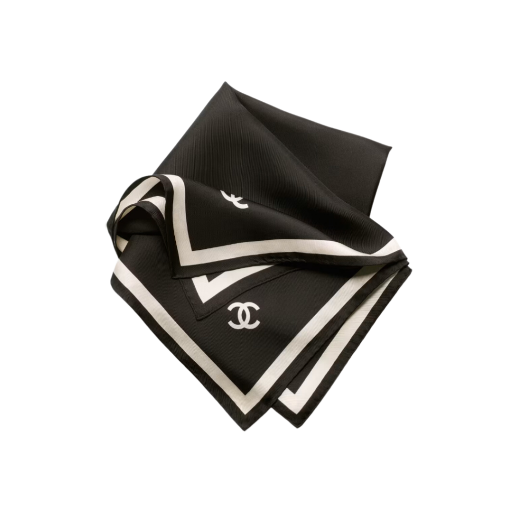 Chanel Square Scarf in black and ecru silk twill, featuring an all-over interlocking CC logo pattern, finished with a contrasting border and 'CHANEL' lettering, adding a touch of elegance to any ensemble.