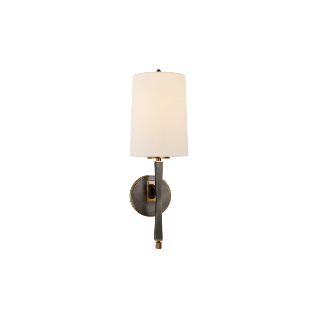 The Montauk Lighting Co Edie Sconce featuring a linen shade and available in multiple finishes, designed by Thomas O'Brien for versatile wall lighting applications.