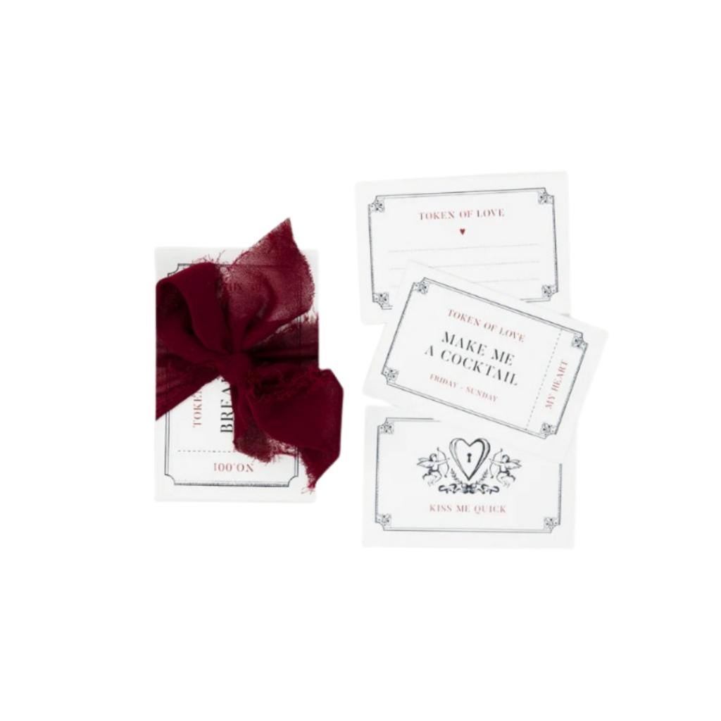 A set of 13 hand-drawn Valentine's Day cards by Gigi & Olive, each featuring unique illustrations and messages. Printed on luxe paper by London's Mount Street Printers, the cards come in a Gigi & Olive cotton pouch.