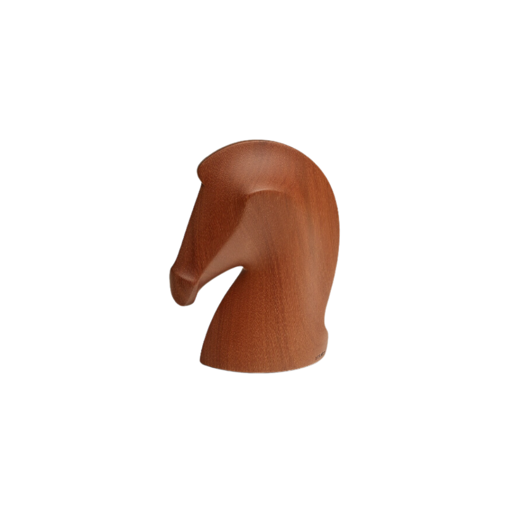 Hermès Samarcande Paperweight, crafted from hand-lacquered wood with a base in taurillon Essentiel leather, featuring multiple layers of lacquer delicately sanded to reveal vibrant colors, serving as both a functional paperweight and a decorative object.