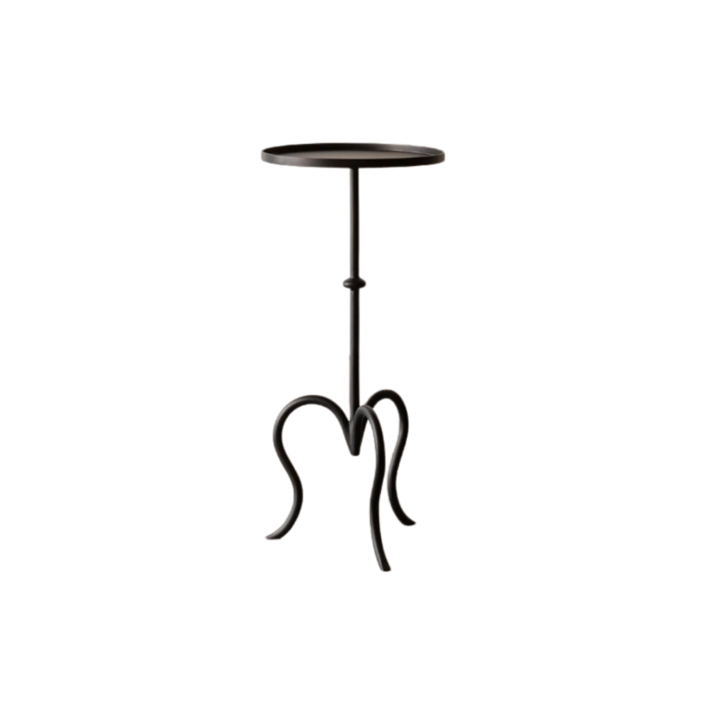 The Lavigne Side Table by Rachel Donath is a sophisticated cocktail table that combines elegance with functionality. Designed to complement various settings, it serves as an ideal spot for placing a drink, book, or cherished items beside a sofa or bed.
