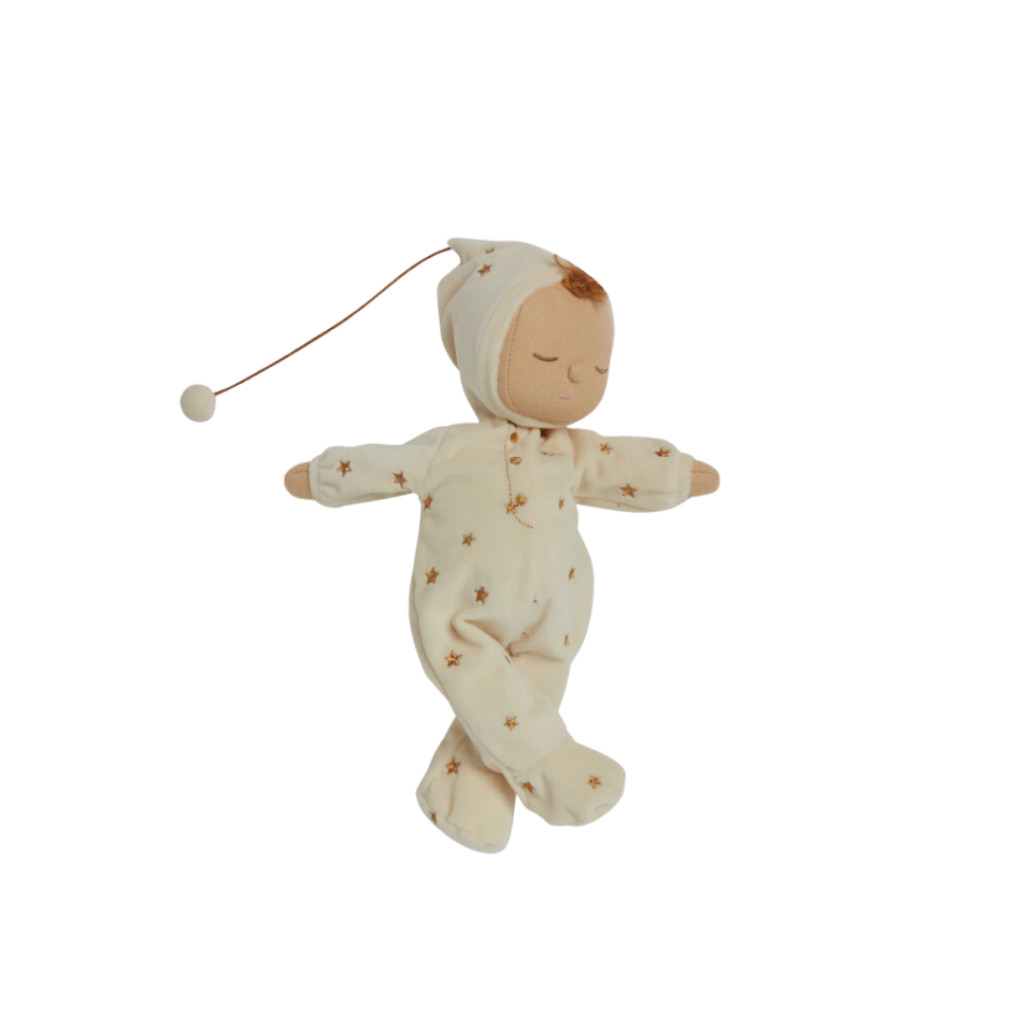 Olli Ella's Lullaby Dozy Dinkum Lyra is a soft, comforting doll featuring a bonnet with a pompom that plays a gentle lullaby when pulled, designed to soothe and delight.