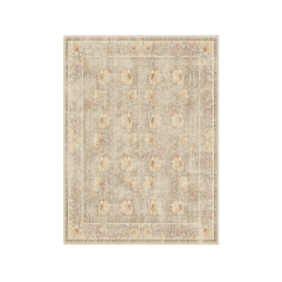 Ruggable's Morris & Co. Pimpernel Vintage Blush Rug features intricate floral patterns in beige, cream, blush, and grey tones, inspired by William Morris' renowned wallpaper design. This rug is water-resistant, stain-resistant, and machine-washable, combining timeless elegance with modern practicality.