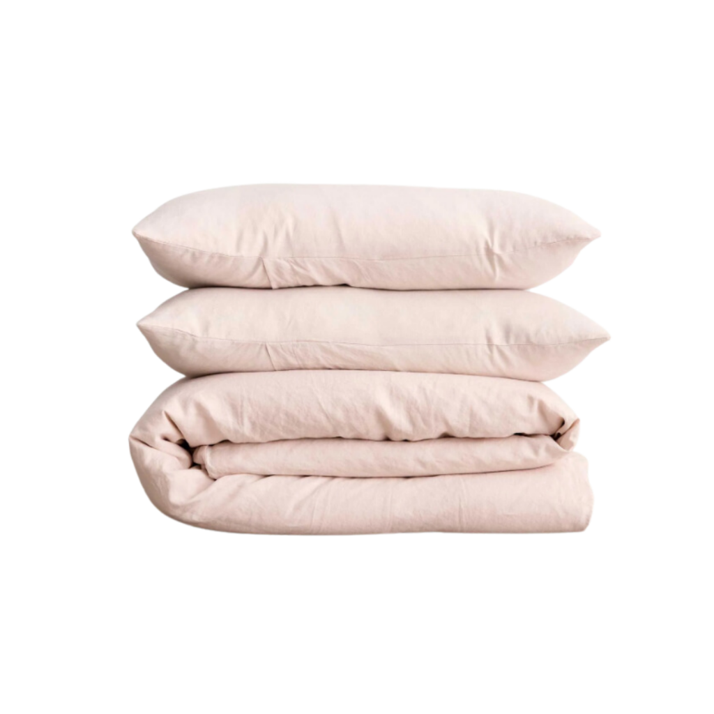 IN BED's Organic Cotton Percale Duvet Cover in Almond, made in Portugal from 100% organic and Oeko-Tex certified cotton with a 300 thread count, offering a lightweight and crisp feel reminiscent of luxury hotel bedding.
