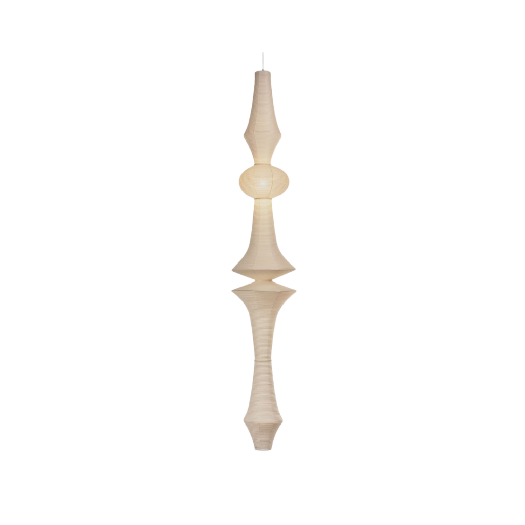 The Vitra Akari E Pendant Lamp, designed by Isamu Noguchi in 1951, features a handcrafted washi paper shade supported by bamboo ribs and a metal frame. Standing at 275 cm in height with a 48 cm diameter, it emits a soft, ambient light, embodying a fusion of traditional Japanese craftsmanship and modern design.