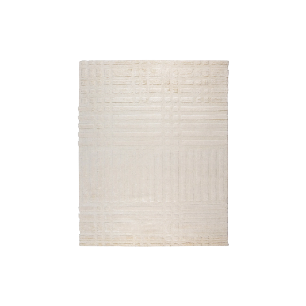 Hand-knotted wool rug in cream with a freeform grid design, blending traditional weaving with sculptural modernity — ideal for refined Australian living spaces.